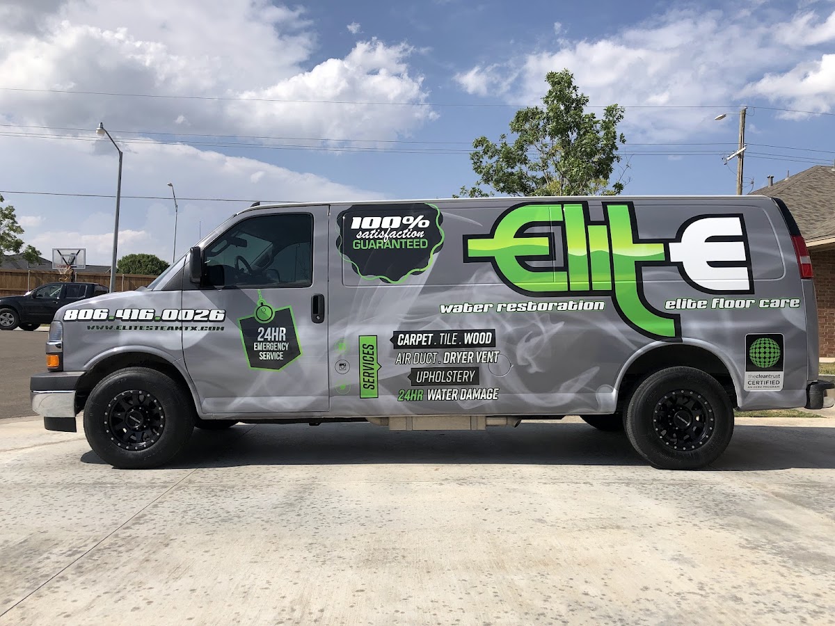 The Elite Steam & Restoration branded service van